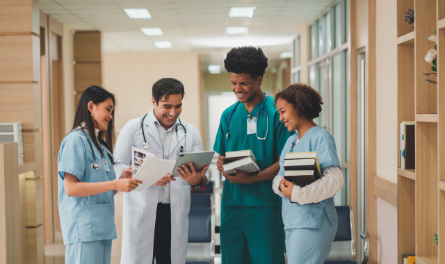 Nursing colleagues discussing how to choose the right nursing program for them to advance their careers